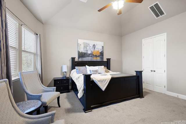 bedroom featuring carpet floors, a closet, ceiling fan, and lofted ceiling