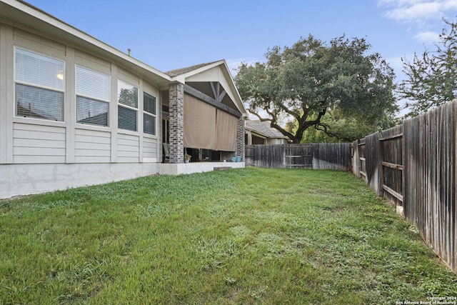 view of yard featuring a fenced backyard