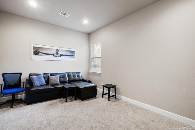 living room featuring light carpet