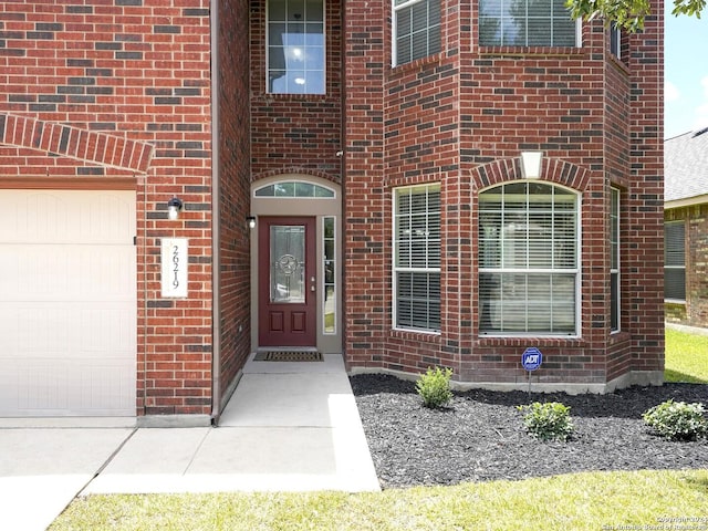 entrance to property featuring a garage