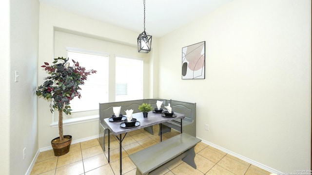 dining room featuring light tile patterned flooring