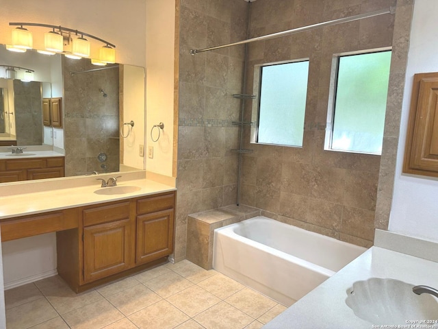 bathroom with plus walk in shower, tile patterned floors, and vanity