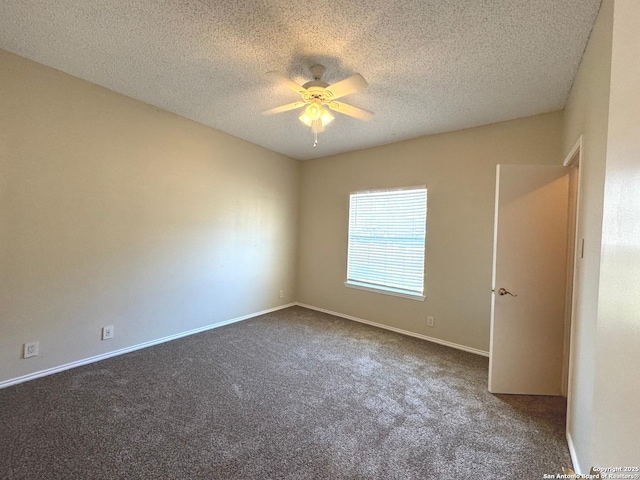 carpeted empty room with a textured ceiling and ceiling fan