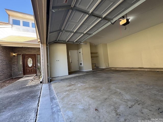 garage featuring a garage door opener