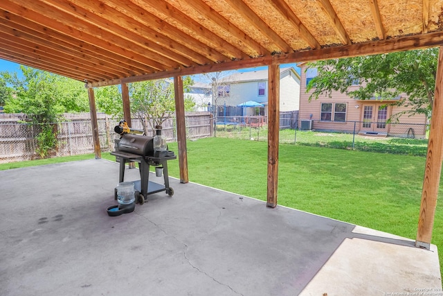 view of patio / terrace with a grill, central AC unit, and a trampoline