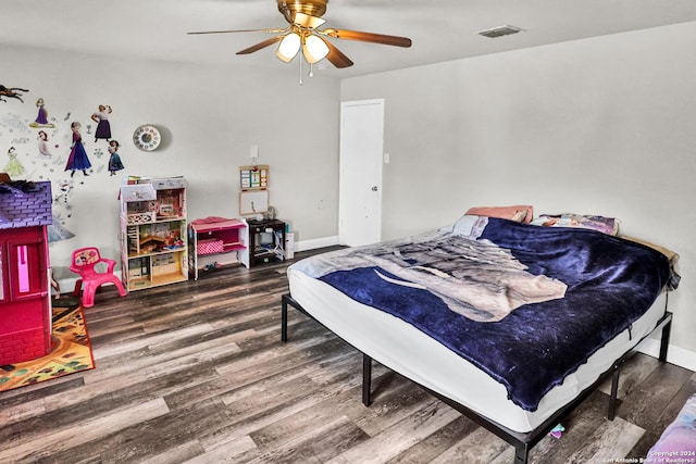 bedroom featuring ceiling fan and wood-type flooring