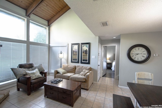 living room featuring light tile patterned flooring, vaulted ceiling with beams, wood ceiling, and a textured ceiling