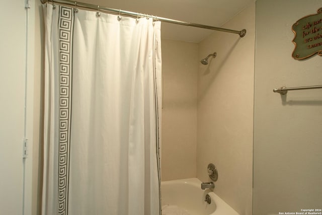 bathroom featuring shower / bath combination with curtain