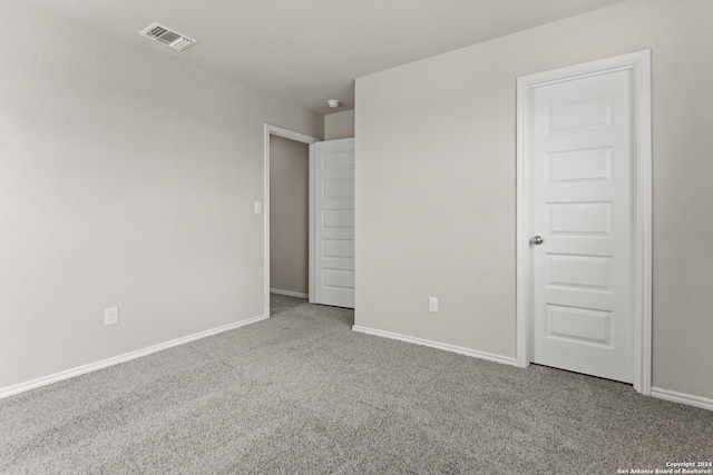 unfurnished bedroom featuring carpet floors