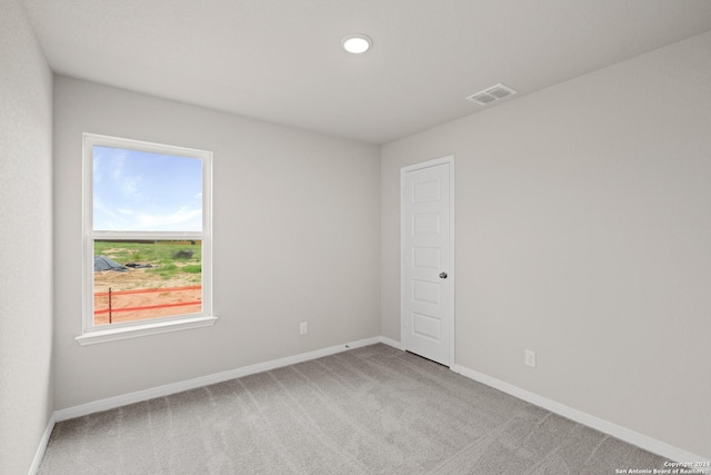 view of carpeted spare room