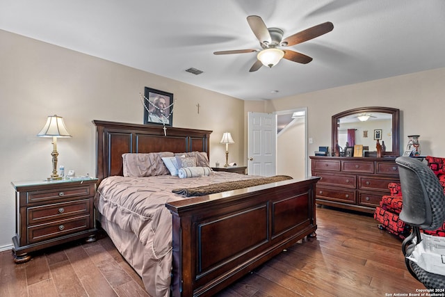 bedroom with dark wood-type flooring and ceiling fan