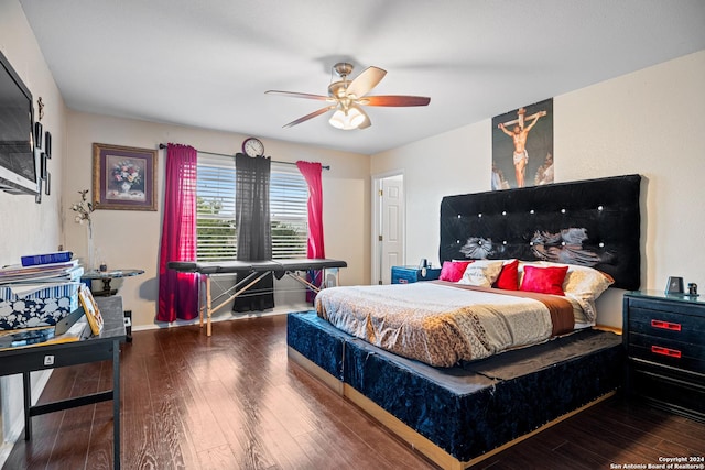 bedroom featuring ceiling fan and hardwood / wood-style flooring