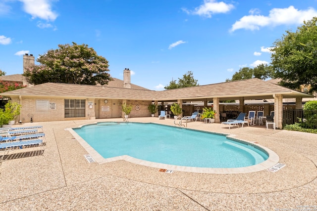 view of pool with a patio