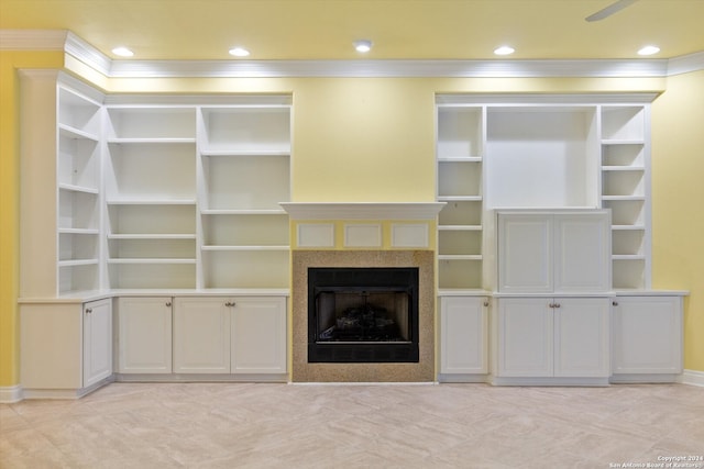 unfurnished living room with ornamental molding