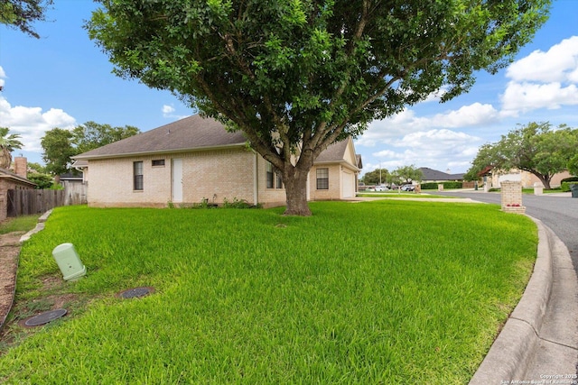 view of yard featuring a garage