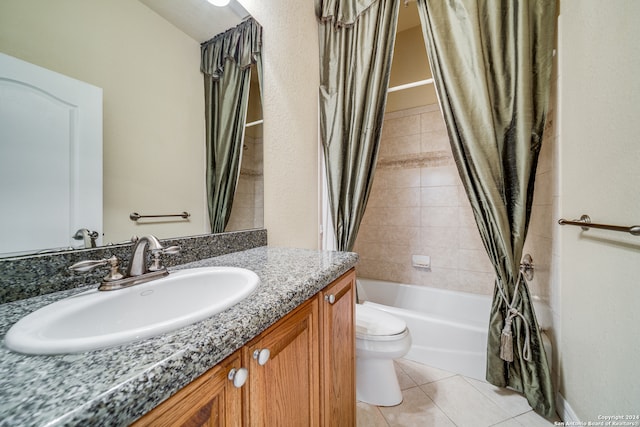 full bathroom with tile patterned flooring, vanity, shower / bath combination with curtain, and toilet