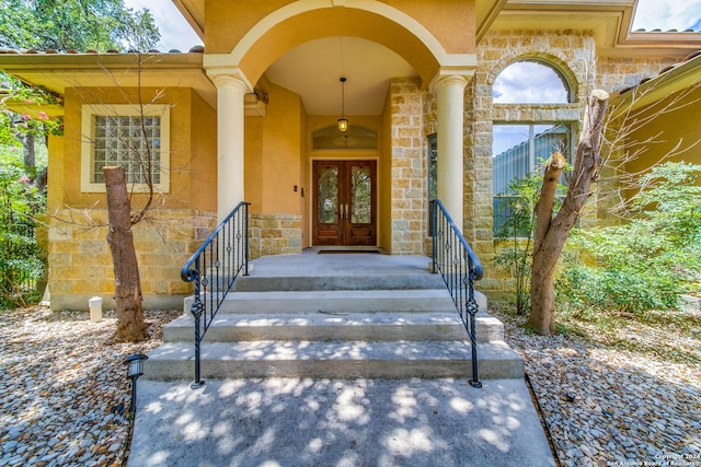 property entrance featuring french doors