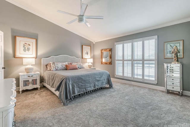 carpeted bedroom featuring ceiling fan, lofted ceiling, and crown molding