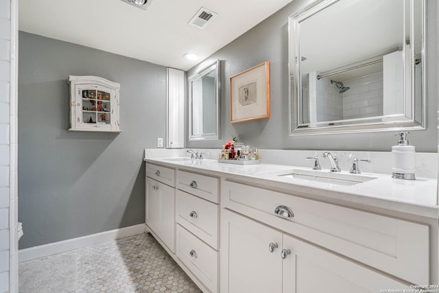 bathroom with vanity and tile patterned floors