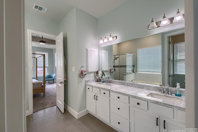 bathroom with vanity, separate shower and tub, and tile patterned flooring