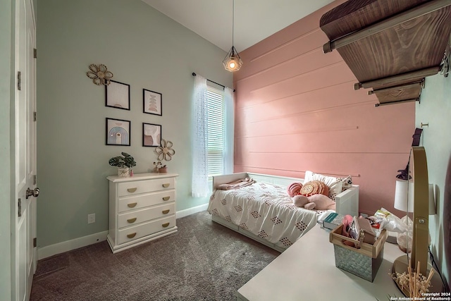 carpeted bedroom featuring lofted ceiling