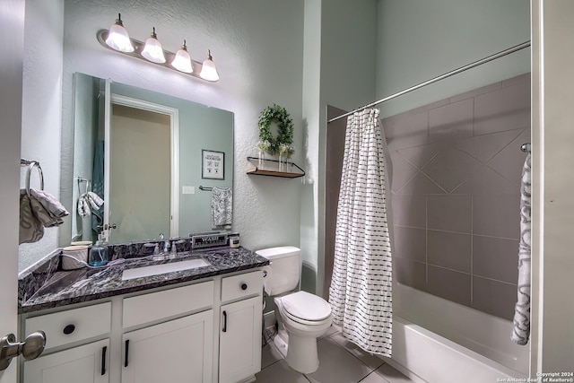 full bathroom featuring toilet, tile patterned floors, shower / bath combo, and vanity