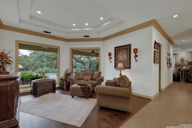 kitchen featuring sink, hanging light fixtures, a kitchen island, light tile patterned flooring, and ornamental molding