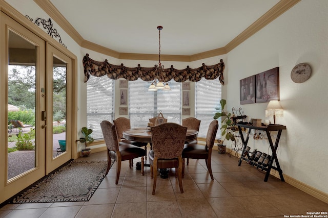 bedroom with ornamental molding, hardwood / wood-style floors, ceiling fan, and a raised ceiling