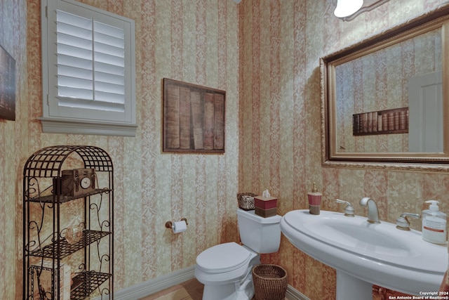 bathroom with a relaxing tiled tub