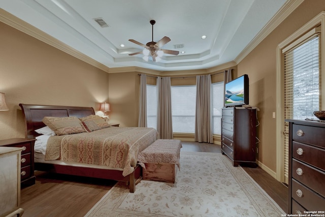 carpeted bedroom with ceiling fan and connected bathroom