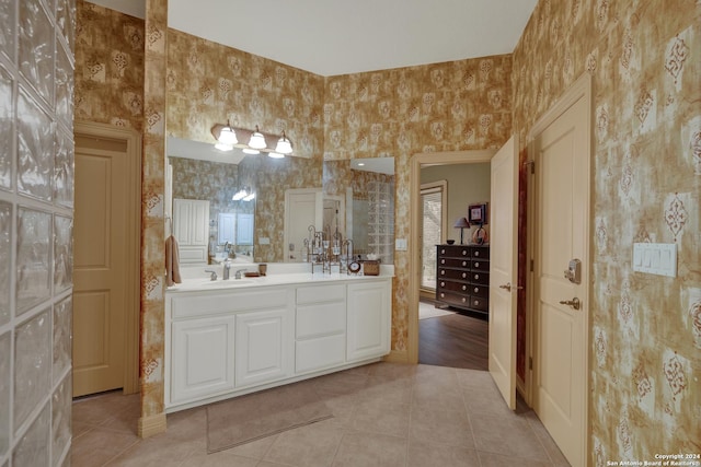 carpeted bedroom with multiple windows and ceiling fan