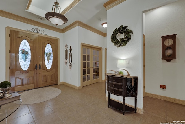 living room with hardwood / wood-style flooring, a raised ceiling, and plenty of natural light