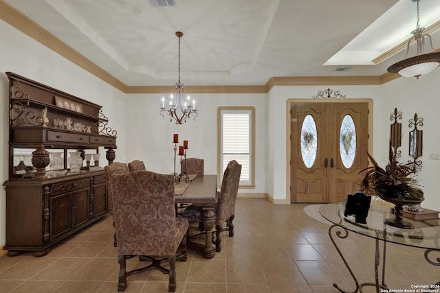 living room with ceiling fan and a raised ceiling