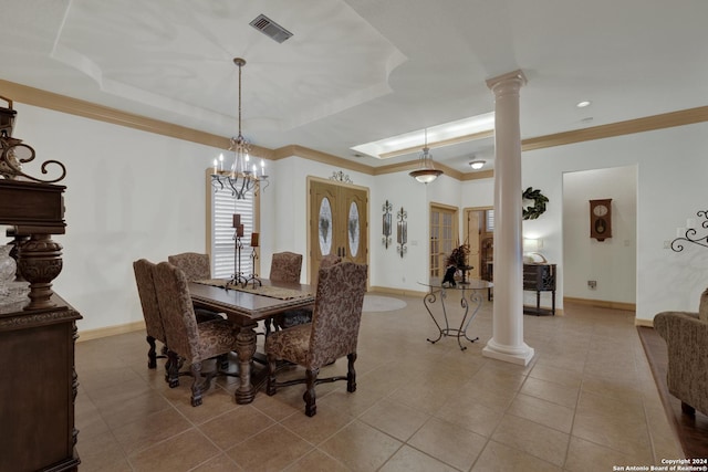 kitchen featuring appliances with stainless steel finishes, pendant lighting, light tile patterned floors, and a kitchen island