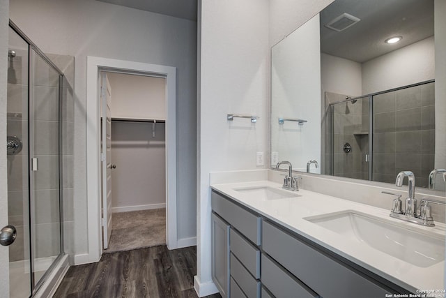 14518 Emerio Dr, San Antonio, TX 78253 - bathroom with wood finished floors, visible vents, a sink, and a shower stall