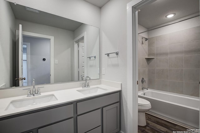 14518 Emerio Dr, San Antonio, TX 78253 - bathroom with toilet, wood finished floors, a sink, and visible vents
