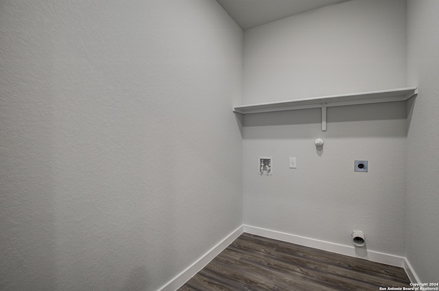 laundry room featuring washer hookup, dark hardwood / wood-style floors, hookup for a gas dryer, and electric dryer hookup