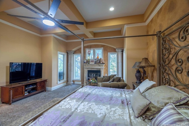 bedroom featuring crown molding, coffered ceiling, decorative columns, and carpet