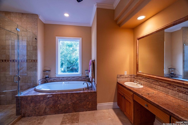 bathroom featuring vanity, backsplash, ornamental molding, and shower with separate bathtub