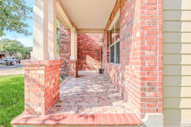 doorway to property featuring covered porch