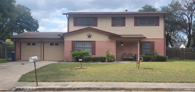 front of property with a garage and a front lawn