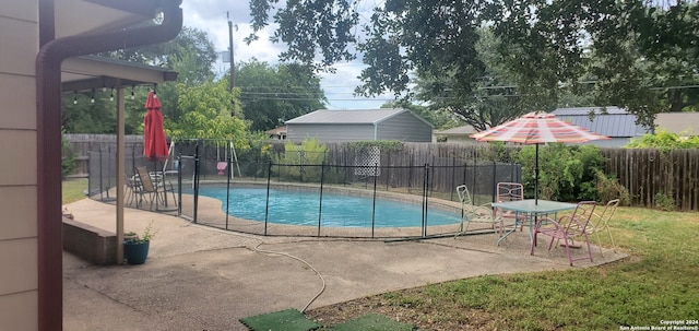 view of pool with a patio area