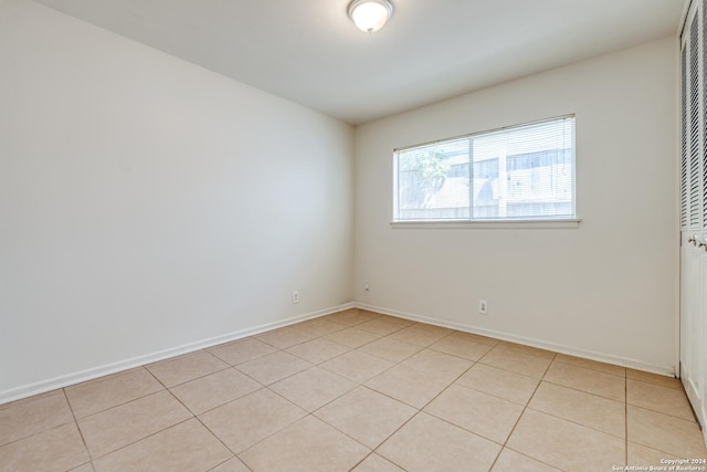 view of tiled spare room