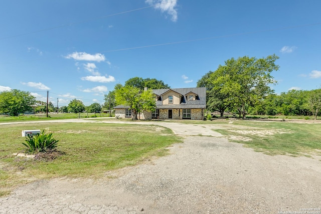 view of front of home with a front yard