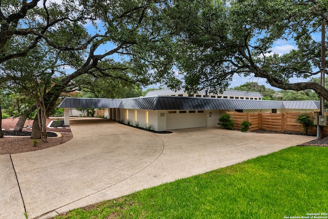 view of patio with a garage and a carport