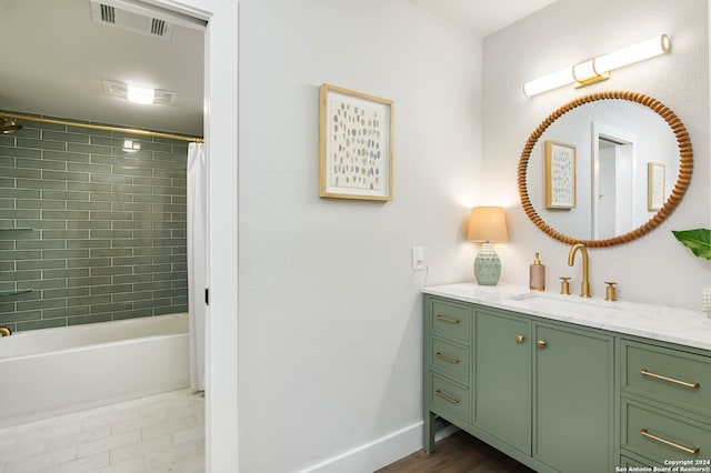 bathroom featuring shower / tub combo with curtain and vanity