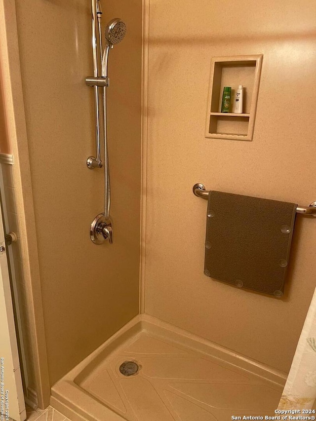 bathroom with walk in shower