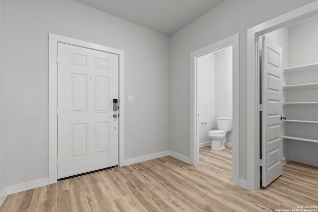 entrance foyer featuring light hardwood / wood-style floors