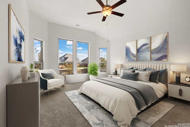 bedroom with carpet, lofted ceiling, and ceiling fan