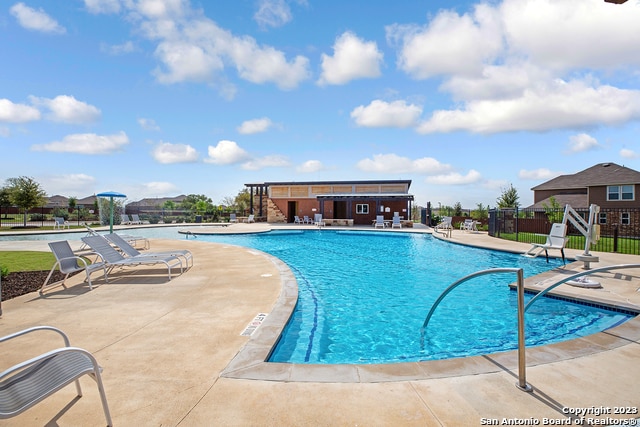 view of pool with a patio